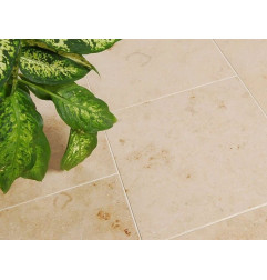 Achievement with the help of the slabs of stone white Jura Beige - softened