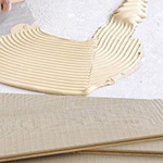 Glue for parquet flooring and for floors and walls